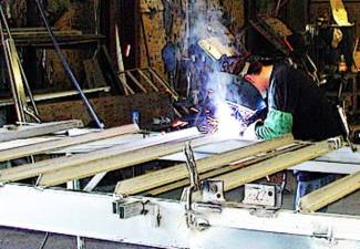 cross support beams of heavy gauge galvanealed steel