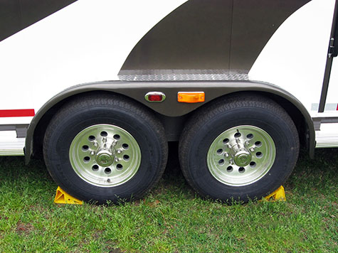 bolted to the sides of the horse trailer body